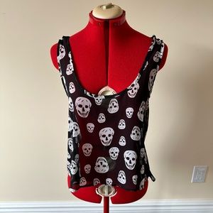 Skull motif top with lacy detail on back.